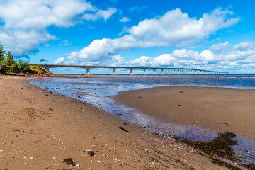 A view along the waters edge towards the Confederation bridge, Prince Edward Island, Canada in the fall