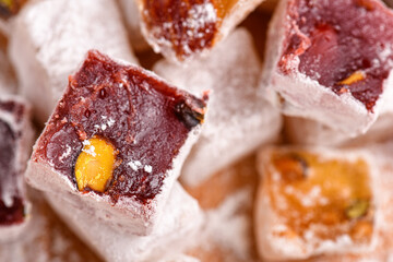Sweet food Turkish delight, assorted rahat locum in form of cubes with nuts and powdered sugar, traditional food
