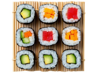 Delicious and Colorful Arrangement of Fresh Sushi Rolls on Bamboo Mat - A Culinary Delight