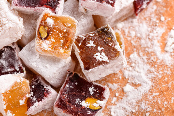 Sweet food Turkish delight, assorted rahat locum in form of cubes with nuts and powdered sugar, traditional food