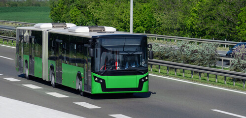 Green bus on the road