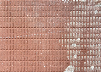 Texture of porcelain tiles with red orange color rectangular repeated pattern dirty ceramic texture...