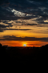 Dramatic sunrise with intense natural orange lights and idyllic dramatic scenery