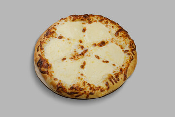 A delicious white pizza that is topped generously with lots of cheese on it