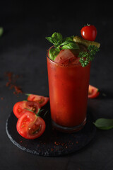A glass with cold bloody mary cocktail
