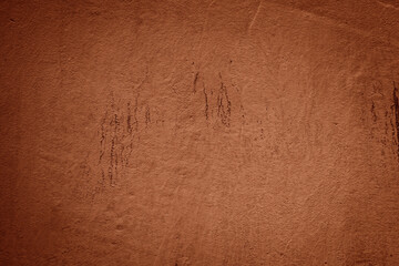 Old brown plaster on the wall