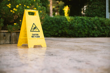 Wet floor sign on wet floor