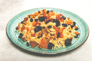 rice dish with dried fruits, nuts and spices of Middle Eastern cuisine, homemade, no people,
