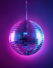 Obraz premium Disco ball hanging from a ceiling with a pink light