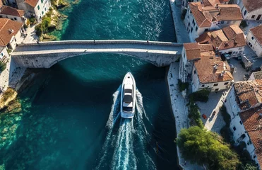 The historic Stari Most bridge in Mostar, Bosnia and Herzegovina, offers a breathtaking view, highlighting its magnificent Ottoman architecture and the pristine waters of the Neretva River