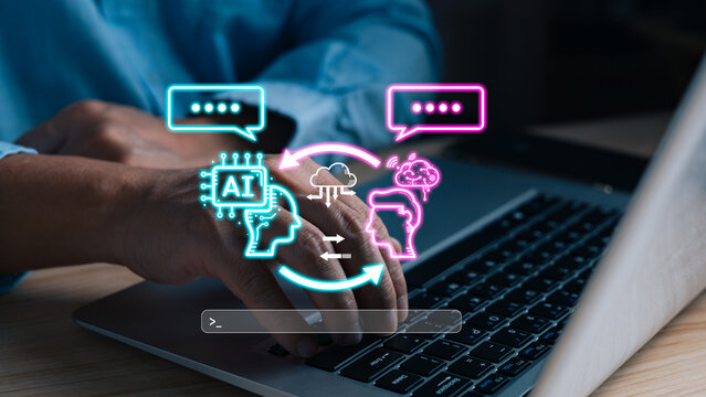 A person uses a laptop with AI chatbot icons overlayed, symbolizing how AI can automate conversations, data sharing, and cloud processes to streamline digital communication. - Powered by Adobe