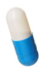 One antibiotic pill isolated on white. Medicinal treatment