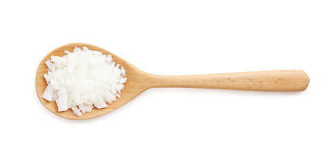 Soy wax in wooden spoon isolated on white, top view