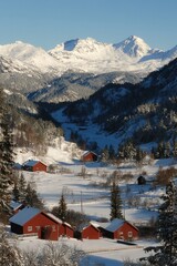 Fototapeta premium The stunning winter scenery of the Lofoten Islands, featuring mountains and fjords, bathed in the beautiful golden light of a morning sunrise in Norway