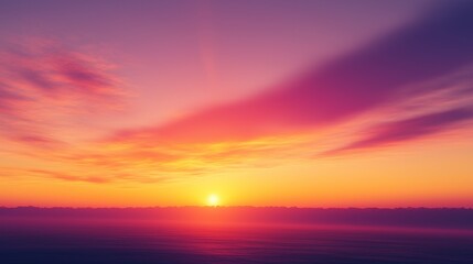 Vibrant sunrise with a gradient of warm oranges, pinks, and purples blending into the sky over the horizon, illuminating the scene.