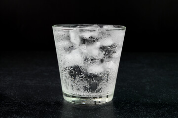 Soda served in a glass cup.