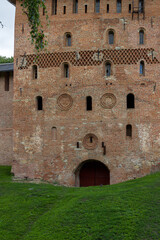The Kremlin of Veliky Novgorod on a green field