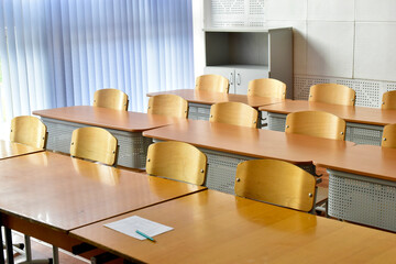 Empty desks and chairs at school. School holidays.