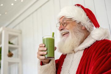 Festive Santa Enjoying Healthy Green Smoothie for a Modern Holiday