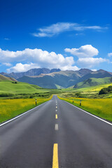 Fototapeta premium Open Road Adventure: An Inviting Asphalt Road to The Horizon Between Mountains and Blue Sky