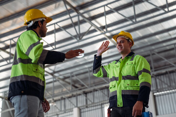 The staff is working in the office document storage area. The warehouse workers are checking the stock on the shelves in the production department.