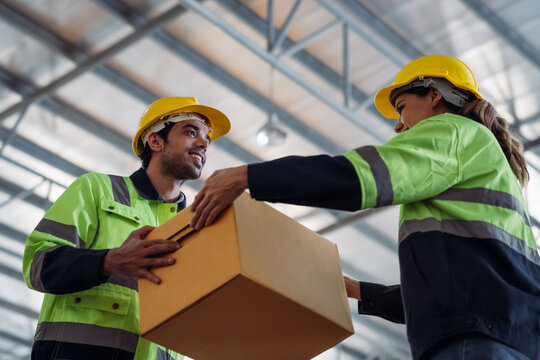 The staff is working in the office document storage area. The warehouse workers are checking the stock on the shelves in the production department.