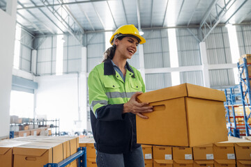 The staff is working in the office document storage area. The warehouse workers are checking the...
