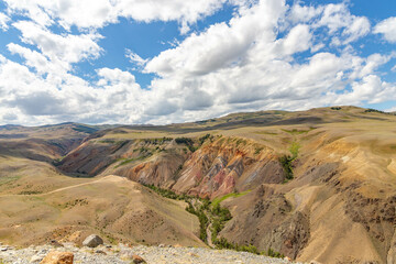 Fototapeta premium Altai Mars number two (multicolored mountains). Kyzyl Chin valley, also called as Mars valley. Chagan Uzun village, Altai republic, Russia. 