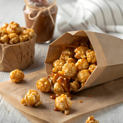 Popcorn is a light, crunchy snack made by heating corn kernels until they pop