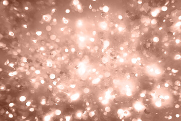 Demonstrating Mocha mousse color of the year 2025. Brown sepia bokeh light wallpaper. Blurry...