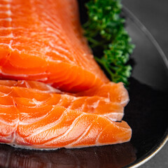 salmon raw fresh fish seafood fresh tasty food dish вelicious gourmet food background on the table...