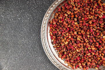 Sichuan pepper spice pepper peas fresh tasty food gourmet food background on the table rustic food top view copy space