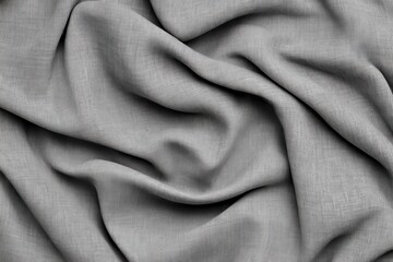 Fototapeta premium Close-up of soft, wrinkled gray fabric, showcasing texture and depth.