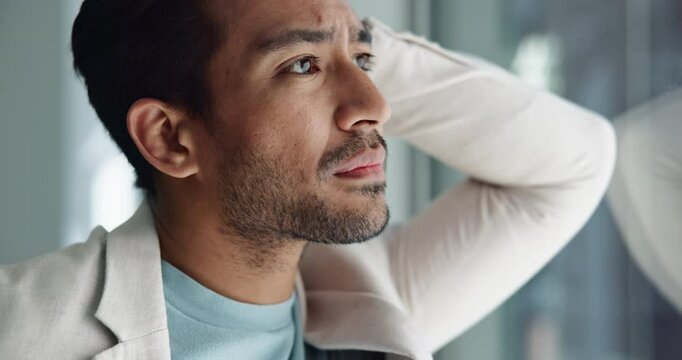 Thinking, anxiety and window with business man in office for problem solving, bankruptcy and frustrated. Stress, reflection and vision with male person in agency for memory, future and crisis worry