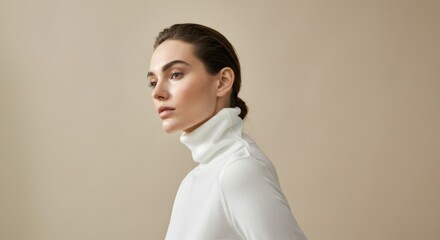 Obraz premium Young caucasian female in white turtleneck with neutral background