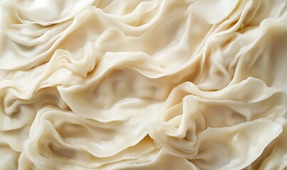 Obraz premium Creamy White Dough Sheets Arranged In Soft Waves