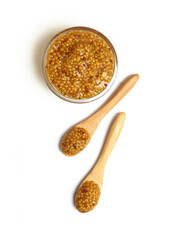 bowl with mustard sauce on white background