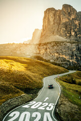 2025 New Year road trip travel and future vision concept . Nature landscape with highway road...