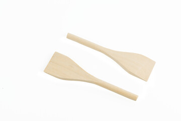 Two wooden sticks with a pointed end. The sticks are not very long and are not very thick