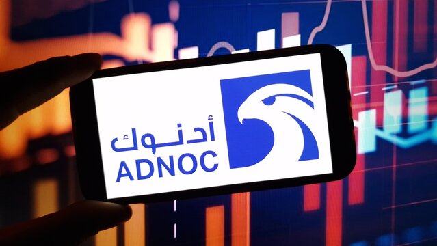 Konskie, Poland - December 14, 2024: Abu Dhabi National Oil Company logo displayed on mobile phone