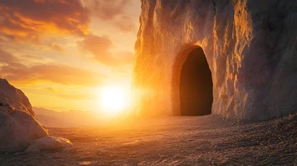 Gardinen Sunset illuminates cave entrance in rocky landscape © irawan