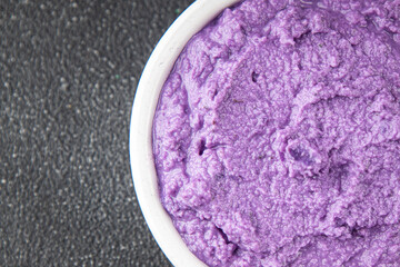 purple mashed potatoes fresh tasty food dish delicious gourmet food background on the table rustic food top view copy space keto and paleo diet Vegetarian and vegan food