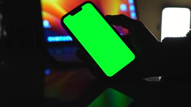 Chrome key on the phone.
Green display on the phone.
Screen on a smartphone.
Green screen.
Blank screen to replace the background.
Gadget with a green screen.
Green display