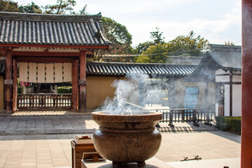 Incense burning in Yakushi-ji, one of the most famous ancient Buddhist temples in Japan, built in 680 AD in Nara, Japan