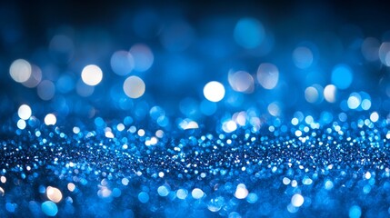 Shimmering blue glitter with glowing bokeh lights