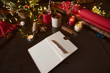 Festive desk setup with open journal