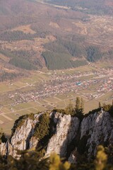 From a high vantage point, the breathtaking landscape reveals a picturesque village nestled in the...