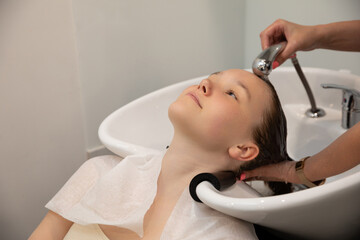 Enjoy a completely relaxing hair wash experience while being pampered in a salon setting