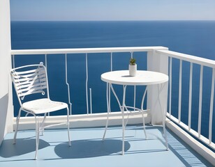 Obraz premium A white metal table and chair on a balcony overlooking a calm blue ocean with a clear sky in the background
