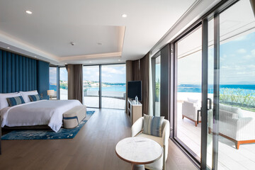 Modern hotel room with a bright and airy feel, a luxury hotel room. Example of a hotel room, modern furnishings and architecture.